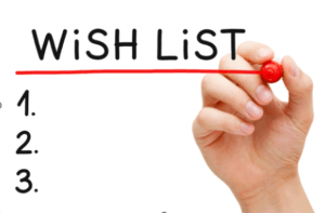 CoCarting image, A hand writing 'WISH LIST' with a red marker, underlining the text, and listing numbers 1 to 3 below. Represents a wishlist or shopping list concept.