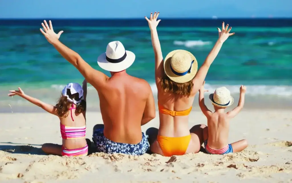 Family enjoying beach day — perfect for wishlist memories.