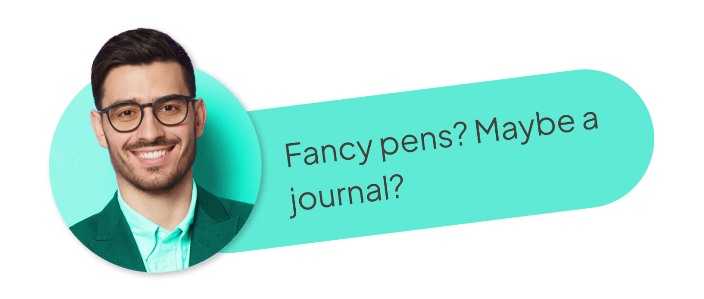 Man thinking about journals and pens for his wishlist.